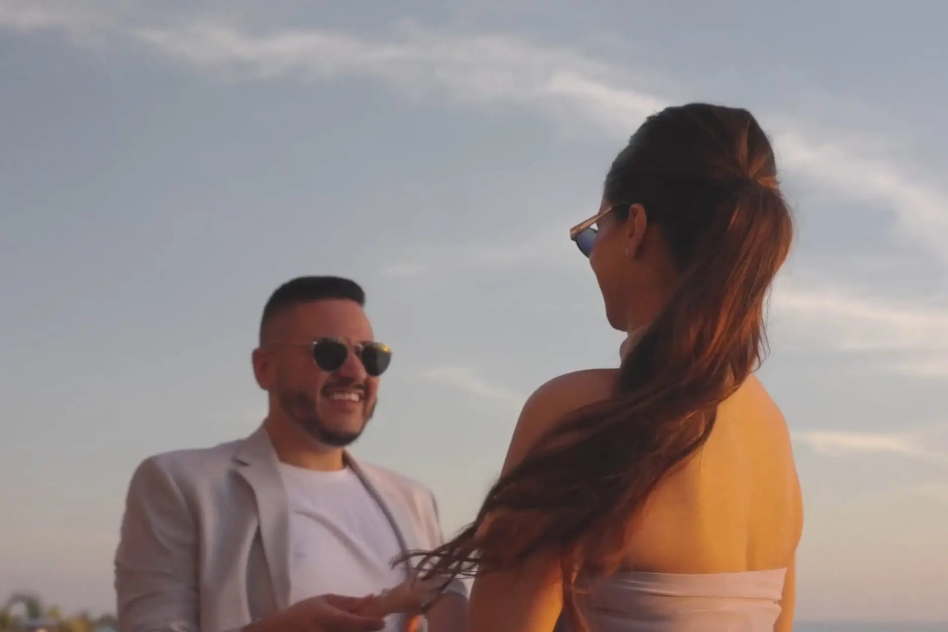 Newly engaged couple dance on the beach at the NOBU Hotel Los Cabos
