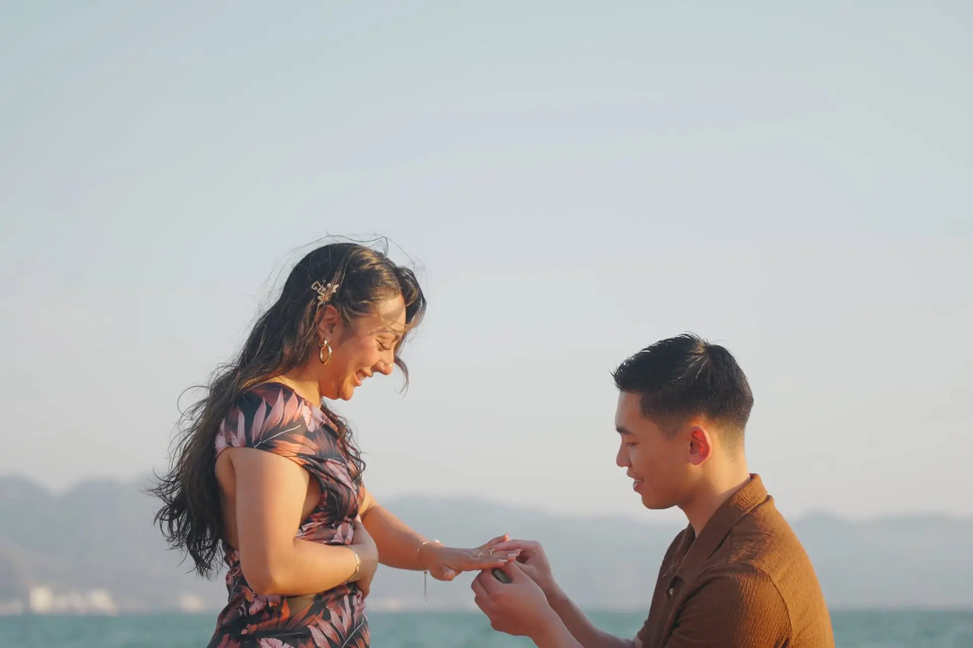 Young man proposing to his girlfriend on the beach in Puerto Vallarta, Mexico