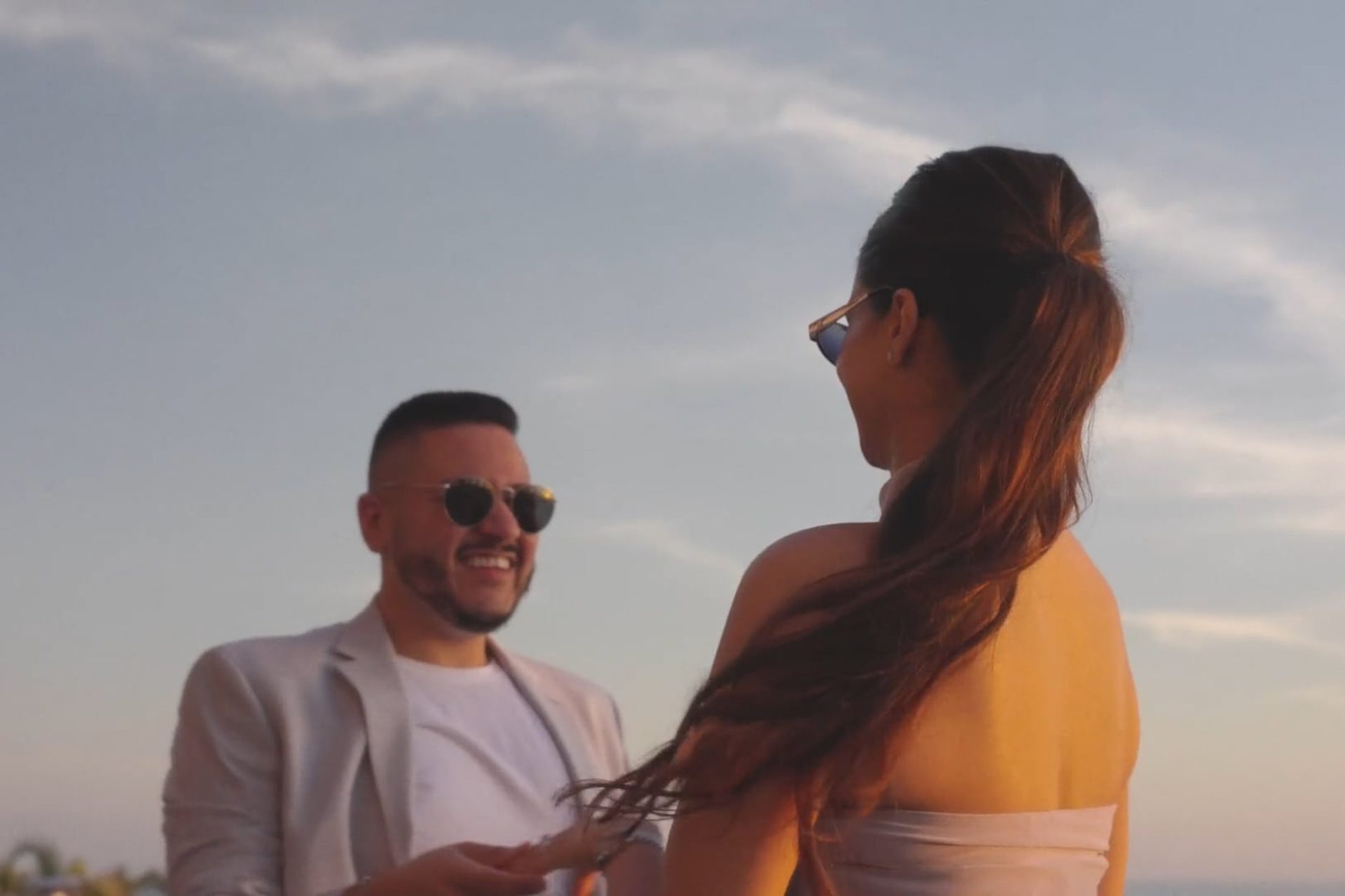 Newly engaged couple dance on the beach at the NOBU Hotel Los Cabos